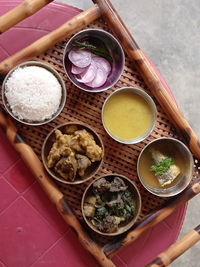 High angle view of assamese thali on table