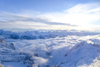 Scenic view of snowcapped mountains against sky