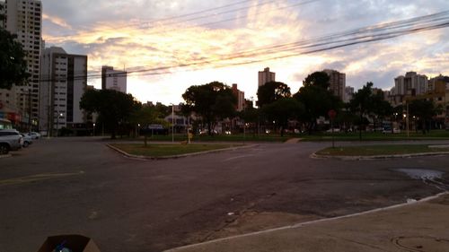 City street against cloudy sky