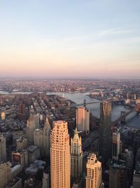 Cityscape against sky during sunset