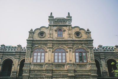 Low angle view of historic building against clear sky