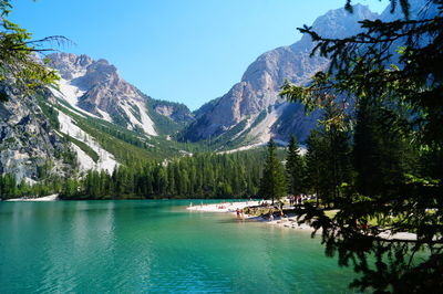 View of calm lake against mountain range