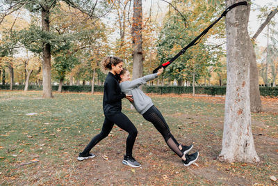 Beautiful women exercising outdoors