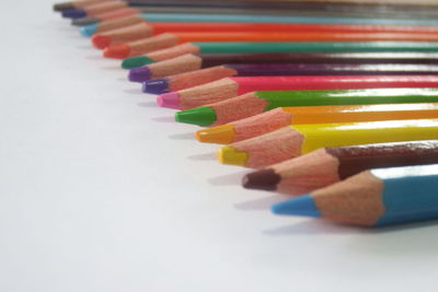 Close-up of colored pencils on table