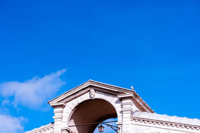 Low angle view of building against blue sky