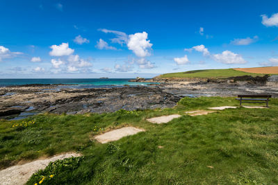 Scenic view of sea against blue sky