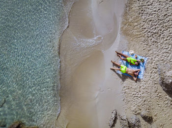 High angle view of people in sea