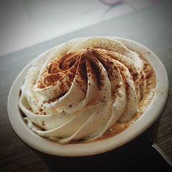 High angle view of cappuccino cup on table