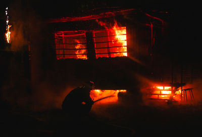 View of fire in dark room