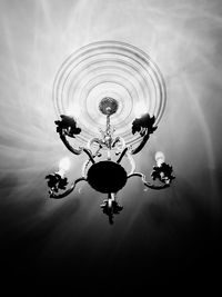 Low angle view of illuminated chandelier