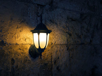 Close-up of illuminated light bulb