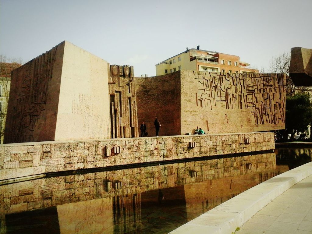 REFLECTION OF BUILDING ON WATER