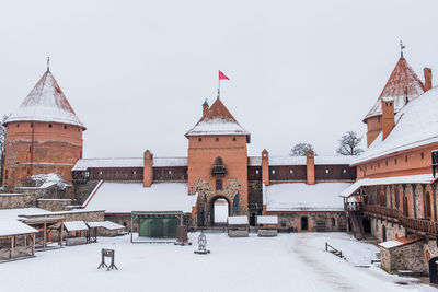 Buildings against sky during winter