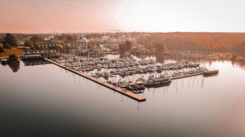 Aerial view of boats in lake against clear sky