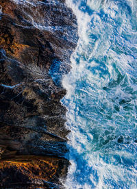 Aerial view of sea and rock formation