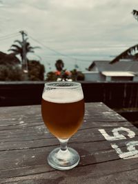 Close-up of beer glass on table