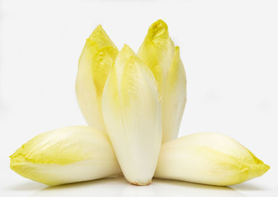 Close-up of bananas against white background