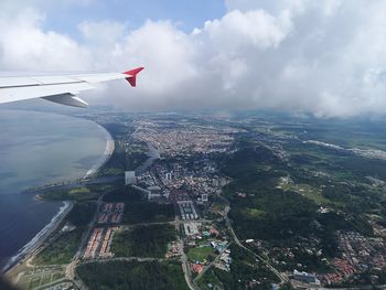 Aerial view of city against sky