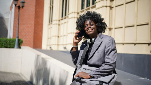 Young woman using mobile phone