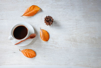 High angle view of coffee cup on table