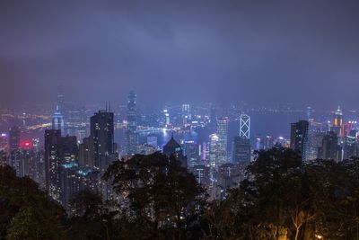 Illuminated buildings in city at night