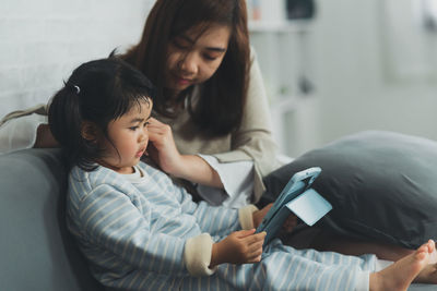 Mother and daughter at home