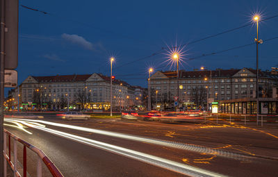 High angle view of light trails on road at night