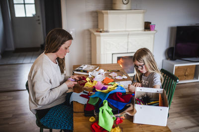 Mother and daughter doing craft