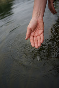 Midsection of person in water