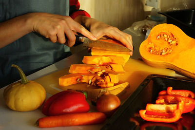 Cooking autumn pumpkin soup-puree. preparation of vegetables. healthy fall vegetables for halloween