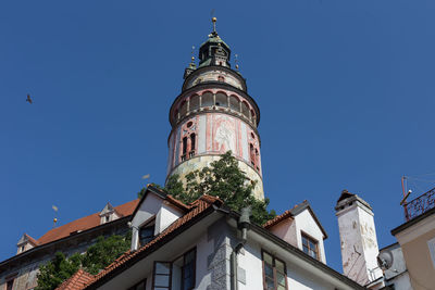 Cesky krumlow, castle tower against the blue sky