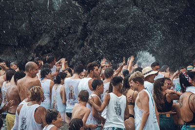 Group of people enjoying in water