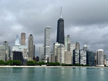 Modern buildings in city against sky