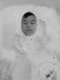 Portrait of boy in bathroom