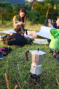 People relaxing on field