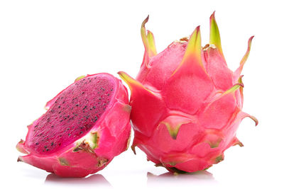 Close-up of strawberry over white background