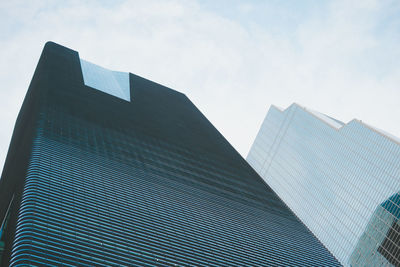 Low angle view of modern buildings against sky