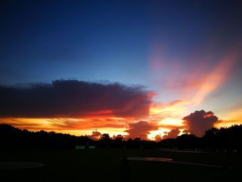 Scenic view of dramatic sky during sunset