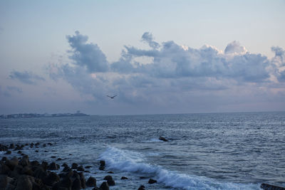 View of sea against cloudy sky