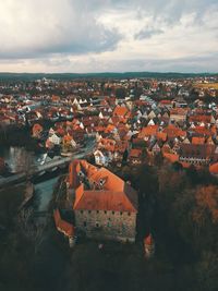 High angle view of townscape against sky in city