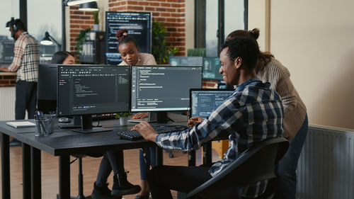 Business colleagues working at office