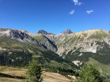 Scenic view of landscape against clear blue sky