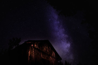 Low angle view of building against sky at night