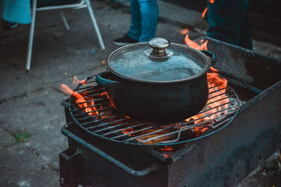 High angle view of meat on barbecue grill