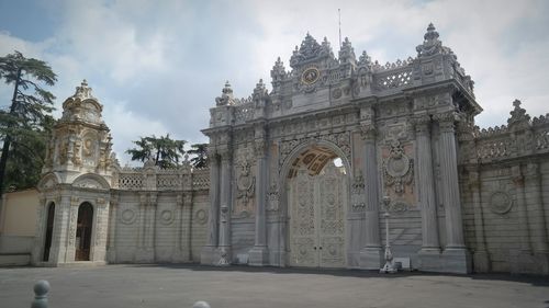 View of historic building against cloudy sky