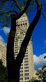 Low angle view of built structure against blue sky