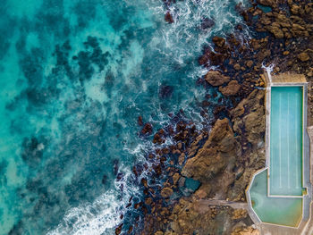 High angle view of rocks on beach