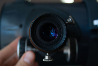 Close-up of hand holding camera