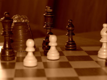 Close-up of chess pieces on board