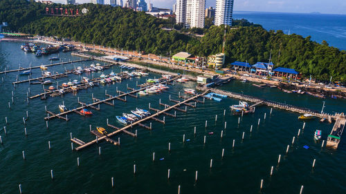 High angle view of boats moored at harbor